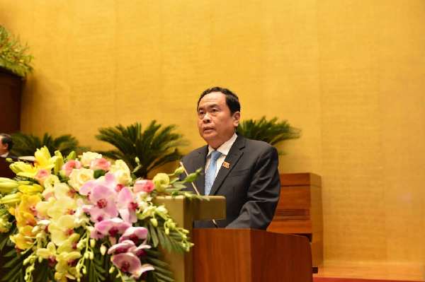 Chủ tịch Ủy ban Trung ương Mặt trận Tổ quốc Việt Nam Trần Thanh Mẫn trình bày báo cáo trước Quốc hội. Ảnh: Báo TN-MT.