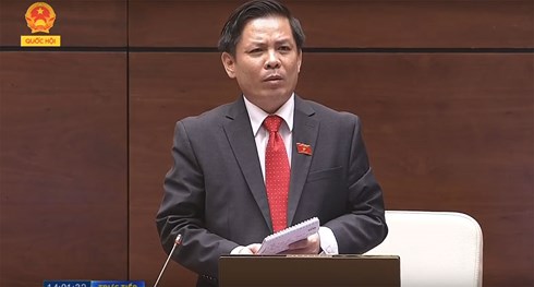 Bộ trưởng Nguyễn Văn Thể trả lời chất vấn trước Quốc hội (Ảnh: Quốc Hội)