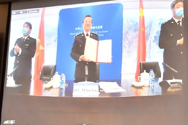 Ông Nghê Nhạc Phong, Tổng Cục trưởng Tổng cục Hải quan Trung Quốc trong tại buổi họp trực tuyến với Bộ NN-PTNT. Ảnh:Tùng Đinh.
